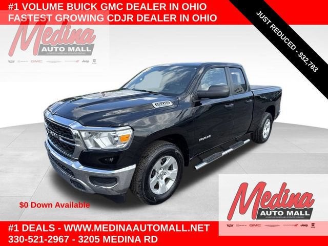 2023 RAM 1500 Big Horn in Pxj Diamond Bla — front three-quarter view