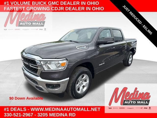 2023 RAM 1500 Big Horn in Granite — front three-quarter view