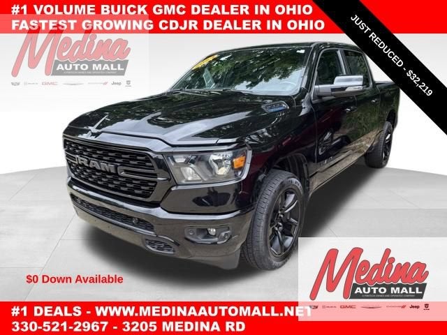 2023 RAM 1500 Big Horn in Black — front three-quarter view