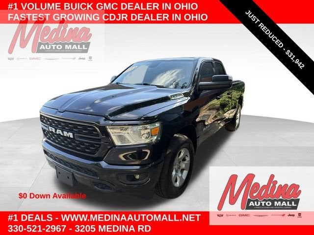 2023 RAM 1500 Big Horn in Black — front three-quarter view