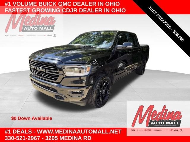 2023 RAM 1500 Laramie in Other — front three-quarter view