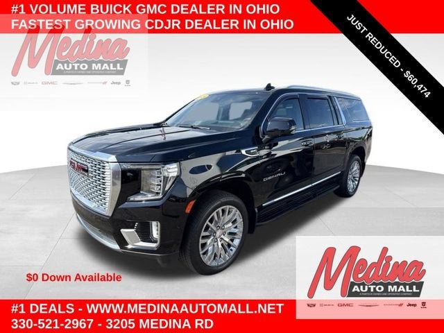 2024 GMC Yukon XL Denali in Onyx Black — front three-quarter view