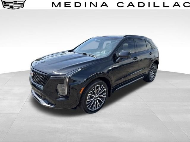 2024 Cadillac XT4 Sport in Stellar Black Metallic — front three-quarter view