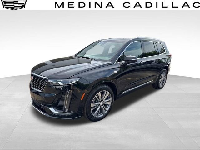 2024 Cadillac XT6 Premium Luxury in Stellar Black Metallic — front three-quarter view