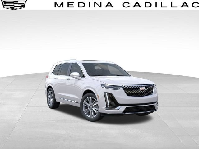 2025 Cadillac XT6 Premium Luxury in Crystal White Tricoat — front three-quarter view