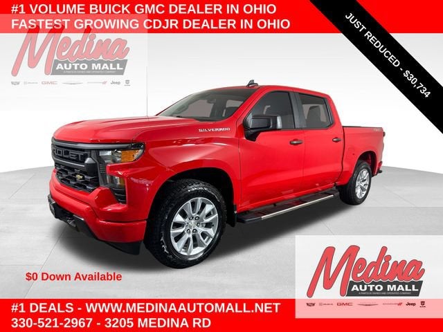 2023 Chevrolet Silverado 1500 Custom in Red Hot — front three-quarter view