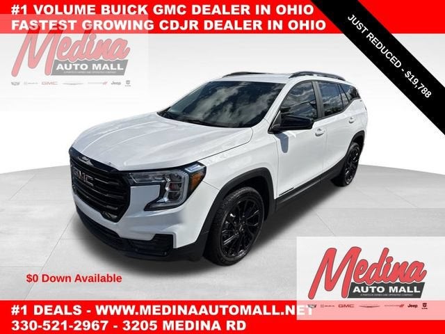 2024 GMC Terrain SLE in Summit White — front three-quarter view