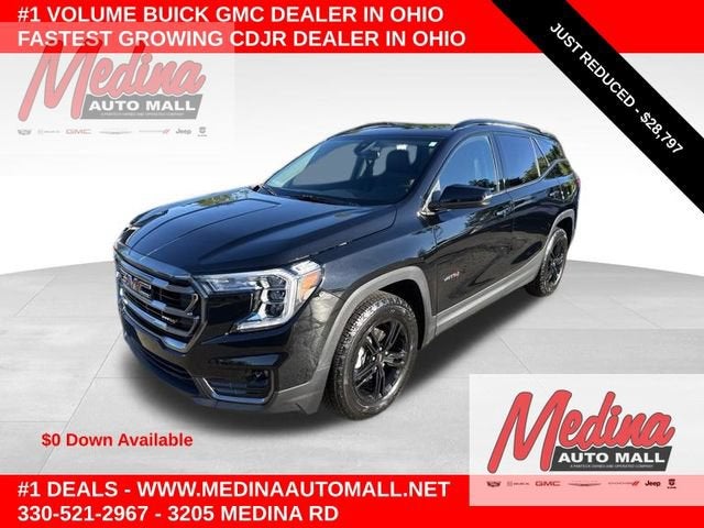 2024 GMC Terrain AT4 in Ebony Twilight Metallic — front three-quarter view