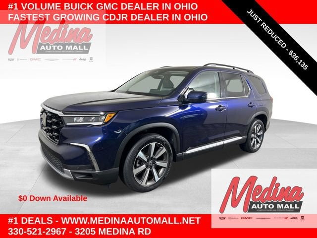 2023 Honda Pilot Touring in Other — front three-quarter view