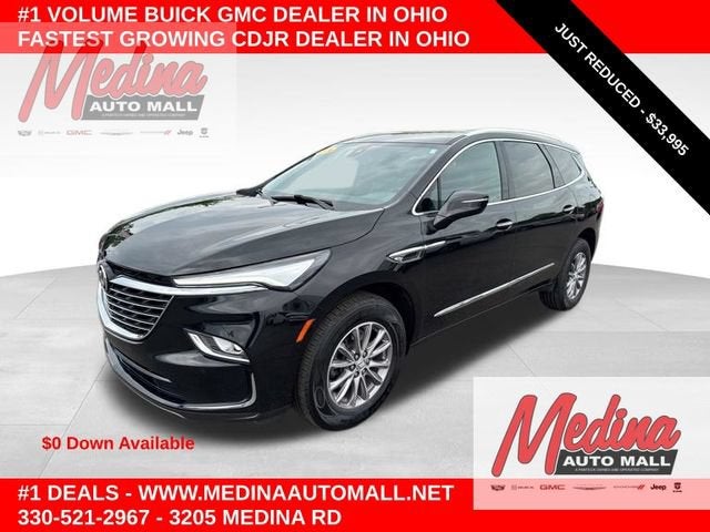 2024 Buick Enclave Essence in Ebony Twilight Metallic — front three-quarter view